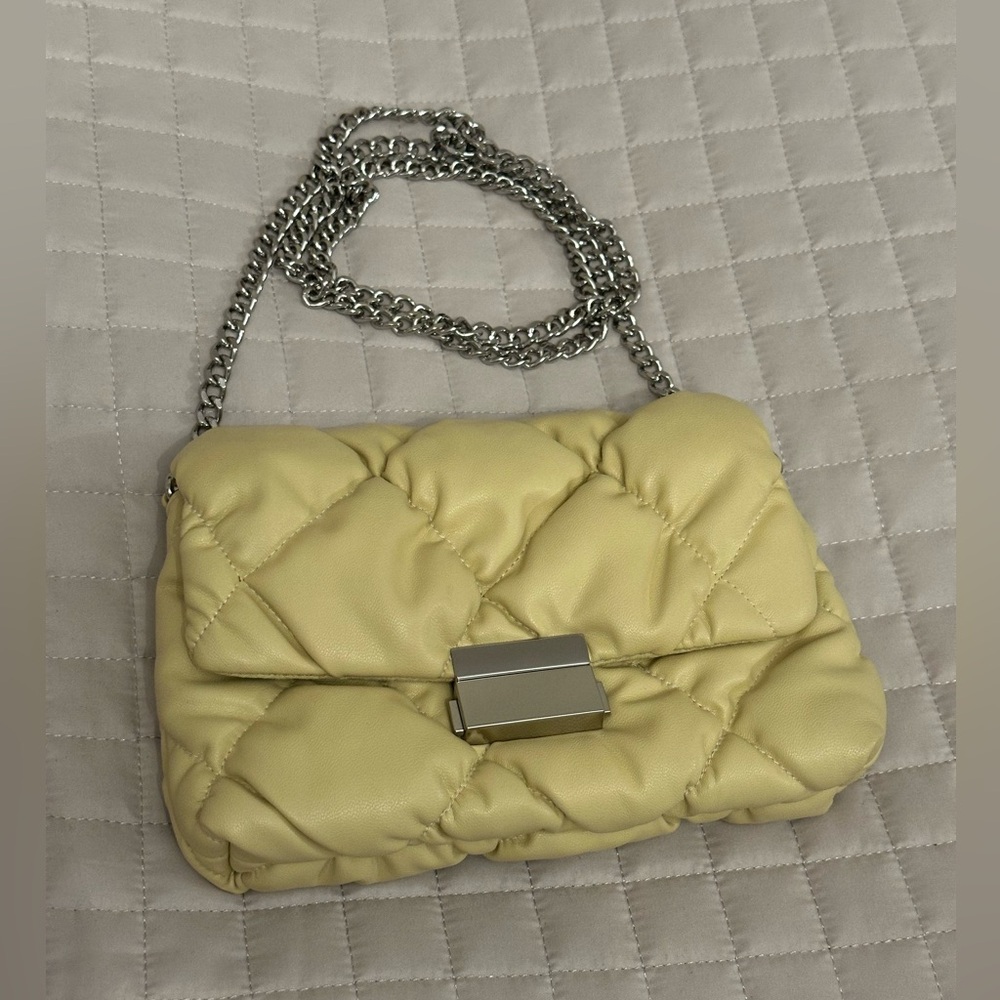 H&M quilted shoulder bag in a yellow color with a silver-toned metal chain strap